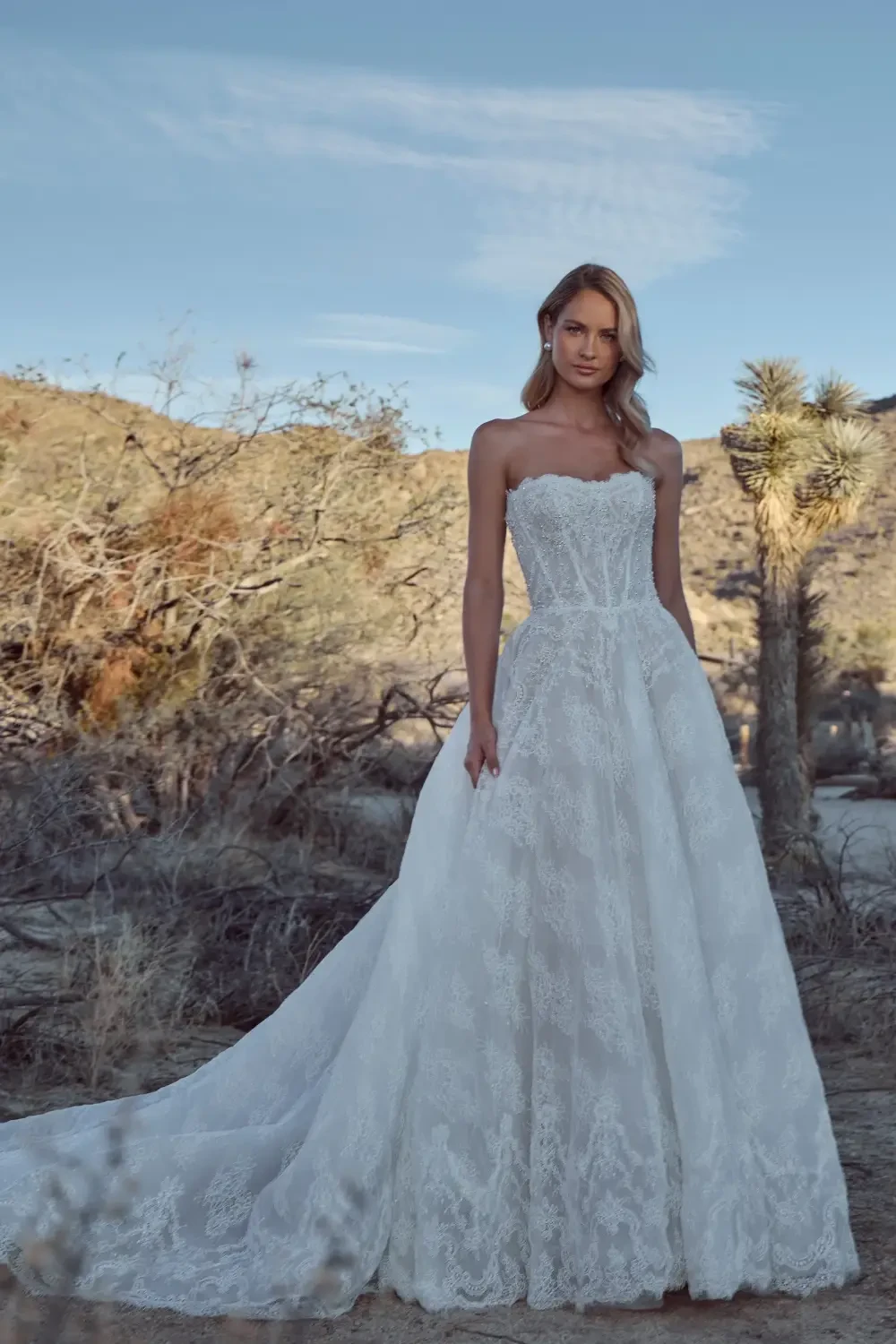 model is wearing an a-line bridal gown