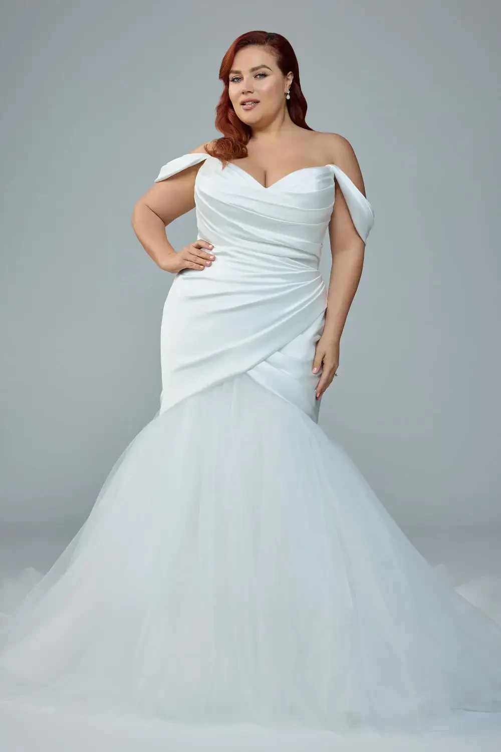 model is wearing a mermaid bridal gown