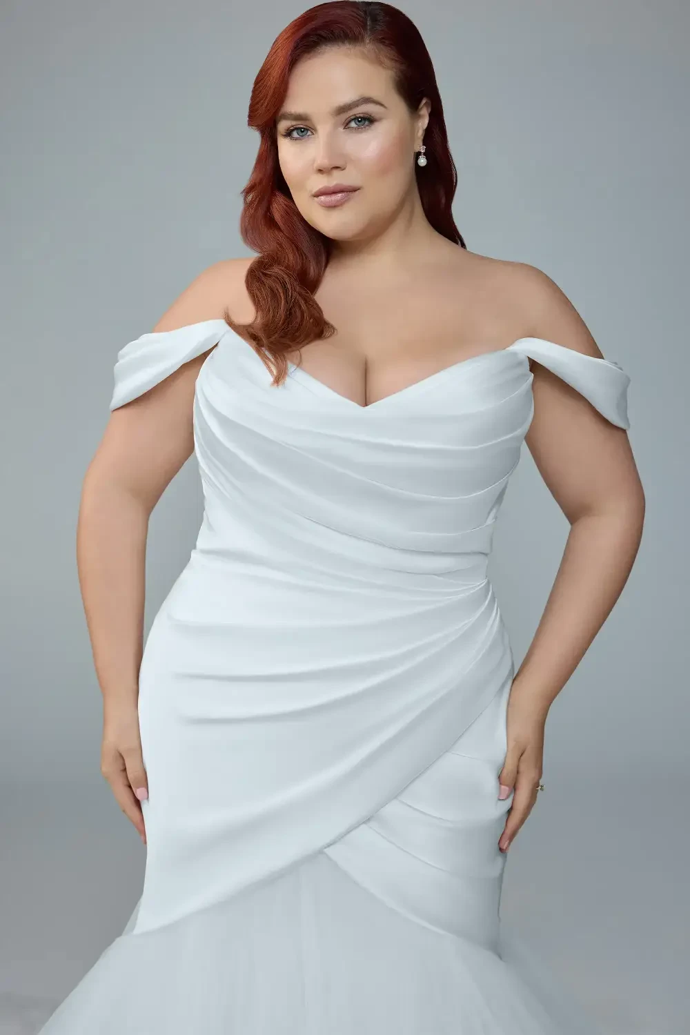 model is wearing a mermaid bridal gown